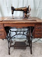 Keystone treadle sewing machine I. 4 drawer oak