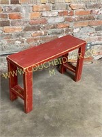 Red primitive bench