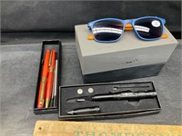 Glasses,flashlight and pen set