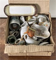 Assorted miniature souvenir tea pots and more