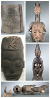 5 West African style masks and figures.