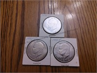Three Eisenhower dollars