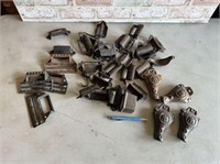 TUB OF METAL HARDWARE ITEMS: CAST IRON STOVE LEGS,