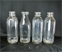 (4) ANTIQUE GLASS MILK BOTTLES