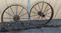 2 odd iron wheels