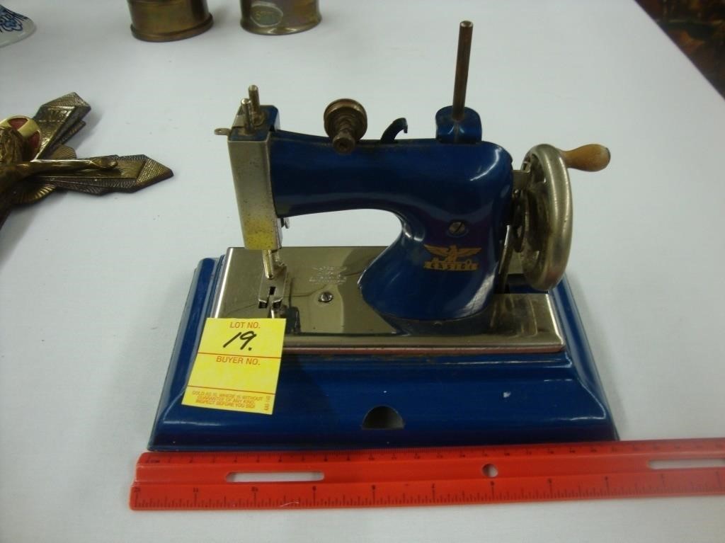 1950’s blue German child’s sewing machine
