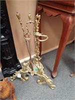 Pair of Brass Andirons together with a Set of
