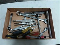 assortment of wrenches, screw drivers, ratchets