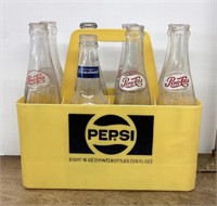Plastic Pepsi carrier with bottles
