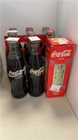 (8) Coca-Cola full glass bottles, Coca-Cola