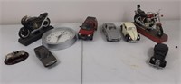 Collection of model cars, motorcycles, and a