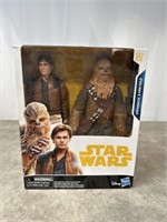 Star Wars Chewbacca and Han Solo figurines in