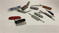 (12) knives, (9) are utility knives/Swiss army