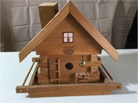 Wooden bird house and feeder