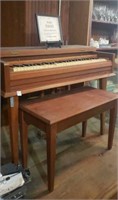 Antique 64 note piano 
40"w x 32"t x 26"d 
Bench