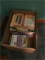 Box of puzzle, game and coloring books