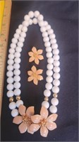 Necklace with clip on earrings.