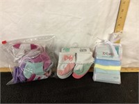 G) six new pair size 0 to 6 months socks, with