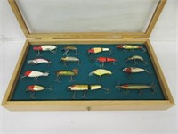 15 Fishing lures by Heddon and others in Oak