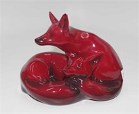 Royl Doulton flambe curled foxes style one.