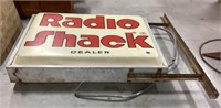Radio Shack sign-not tested attached to metal
