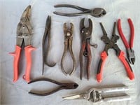 Hog ringers, tin snips and side cutters