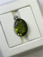 $1000. 14kt. Peridot Pendant (Some Inclusions)