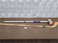 Curling broom and Signed hockey stick