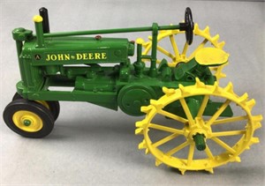 John Deere model, a metal tractor