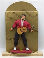 (ST) Elvis Presley Doll. 13 inch. Certificate of