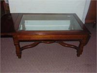 Coffee table with glass center and drop sides