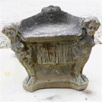 Cast cement garden chair. Early 20th c. Winged