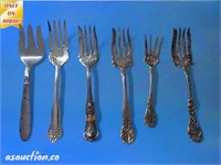 Six silver plated serving forks