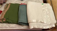 3 Satin trimmed blankets stored with moth balls