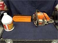 Still 042AV 16in bar chainsaw with gallon jug of