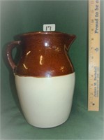 brown/white crock pitcher