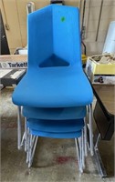 4 Blue Stacking Chairs