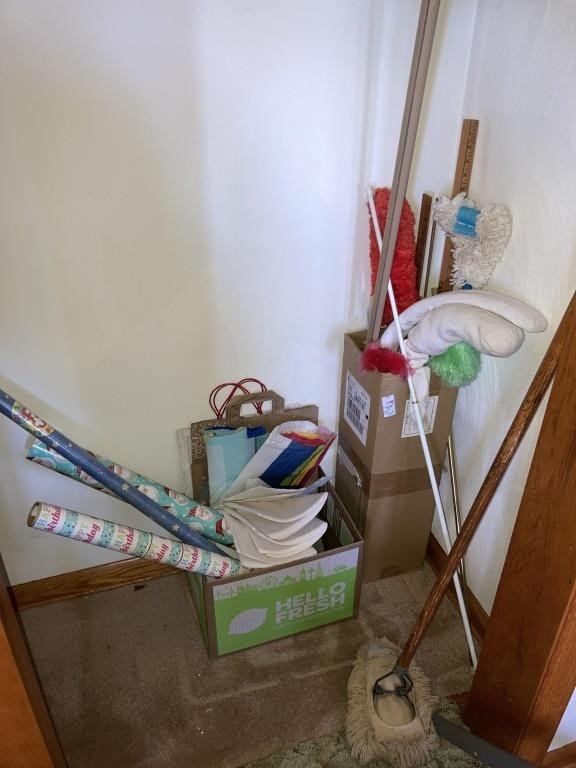Gift wrap, dusters, yardsticks items in bottom