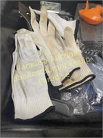 Bin of Knife gloves and misc