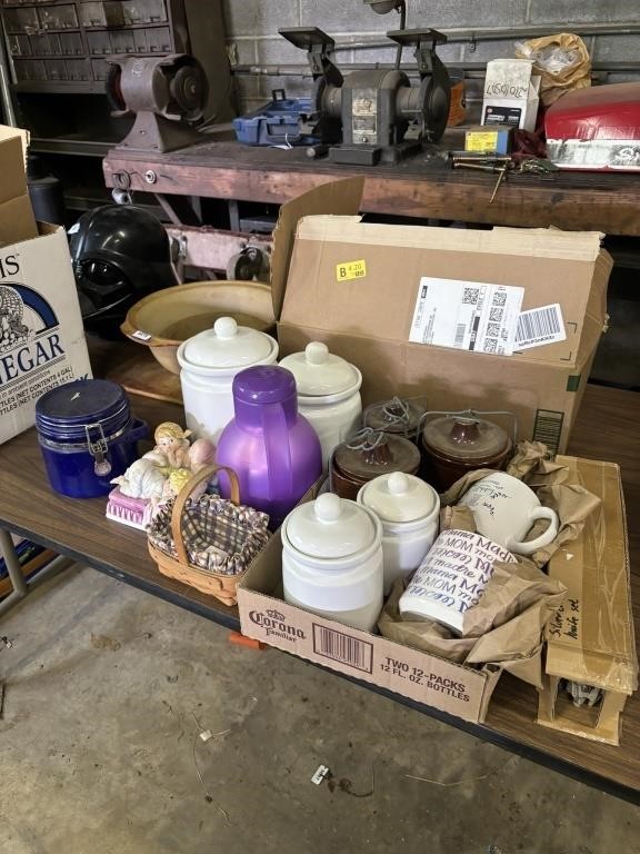 4 white canisters, 3 cheese pots, coffee cup