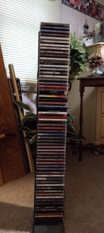 Lot of miscellaneous CD's with stand