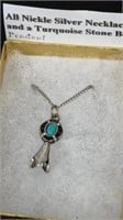 All nickel silver necklace, and a turquoise stone