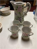 Antique tea pot and cups