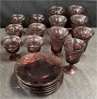 21 pieces of colored glass stemware & plates