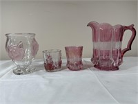 Pink glass pitcher, cup, and vase