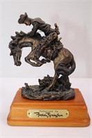 THE RATTLESNAKE FIGURINE BY FREDERIC REMINGTON