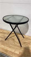 Round glass topped table