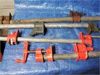 Pipe clamps/spreaders