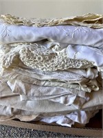 Lot of vintage tablecloths and napkins, some