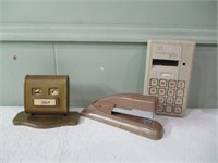 vintage desk calendar, stapler, calculator .